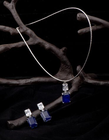 Rhodium Chain With Blue CZ Pendant