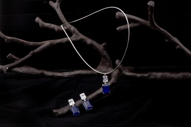 Rhodium Chain With Blue CZ Pendant